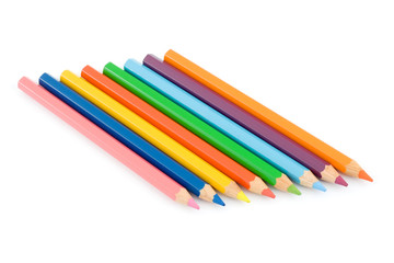 Several color pencils on a white background