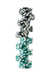 Long stack of casino chips isolated over white background