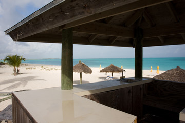 beach bar deck area overlooking sand and sea