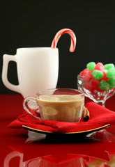 A festive holiday table with coffee, candy and cocktail