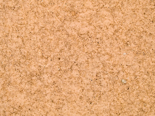 texture of a tan painted cinderblock