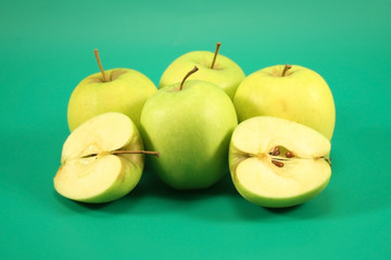 Apples  on a green background.