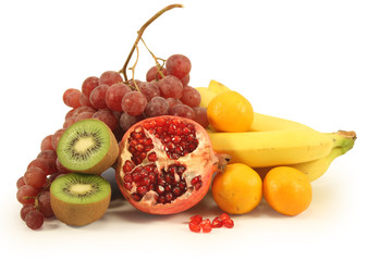 Different fruits on a white background.