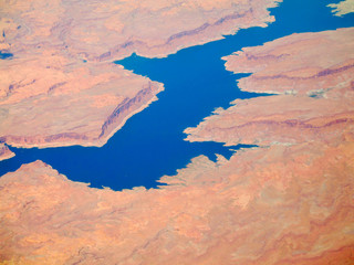 Red cliffs along Lake Powell, Utah, from 30,000 feet