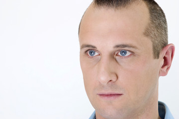 Obraz premium young man with blue eyes on white background