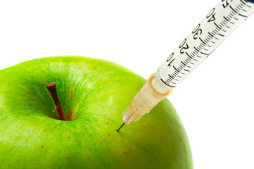 apple and syringe isolated on white background