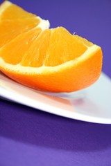 orange on a white plate