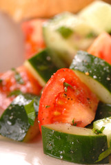 Closeup of a tomato and cucumber salad