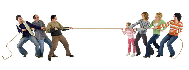 Man and woman playing tug of war - isolated