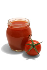 Cherry tomato with juice in transparent jar