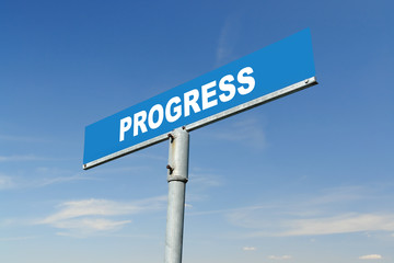 Fototapeta premium Blue metal street roadsign spelling Progress word