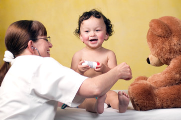 Cheerful baby at the doctor.