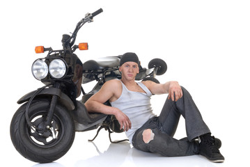 Obraz na płótnie Canvas Handsome young male motorcycle mechanic, 