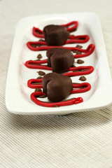 A platter of heart shaped chocolates for valentines day