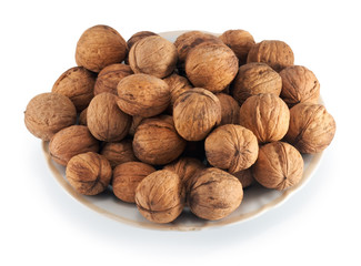 Nuts garden-stuf in plate (isolated on white)