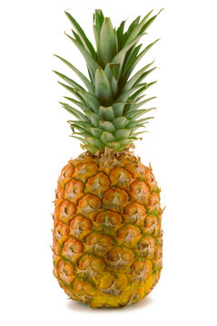 large full pineapple isolated on white background