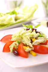 Fresh tomato salad with corn and basil