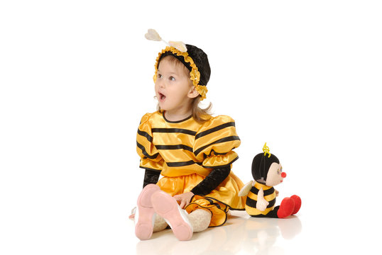 The little girl in dress of a bee