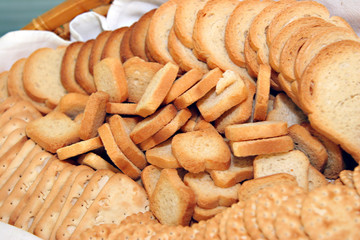 bunch of cookies and toasted bread for cheese