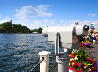 Coin telescope pointing to the sea