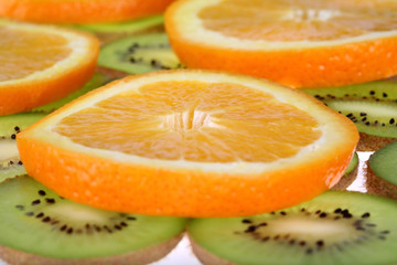 Orange and kiwi slices background