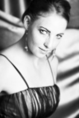 Young female adult fashion model with natural red hair 