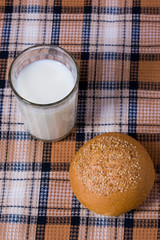 light morning meal, milk with bun
