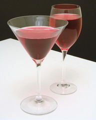 Two Glasses with Red Liquid
