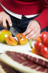 home life: woman preparing something to eat