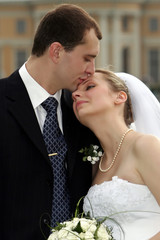 Bride and groom out doors