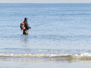 Pescador en el mar