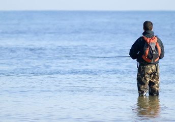 Pescador en el mar