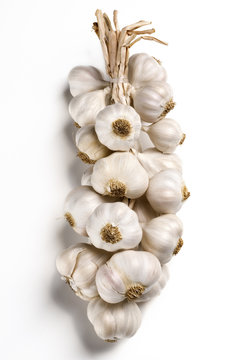 bunch of  garlic bulbs on white