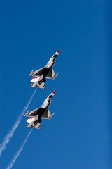 F-16 Thunderbird jets leaving smoke trails