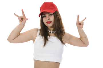 Obraz na płótnie Canvas emotional girl in red cap on insulated background