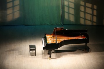 piano on  scene in  concert hall