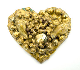 Gold collage heart with pearls and shells