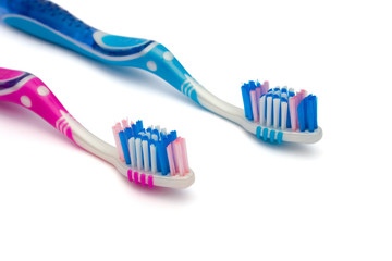 Two toothbrushes, isolated on white background