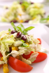 Fresh tomato salad with corn and basil