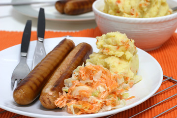 Large frankfurters with carrot and cabbage coleslaw