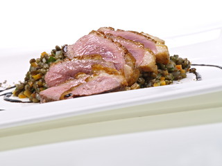 entenbrust an linsensalat