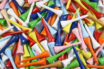 many colored golf tees