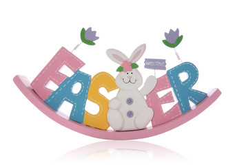 A colorful Easter sign with rabbit over white