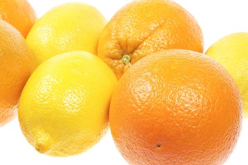 oranges with lemons isolated on white background