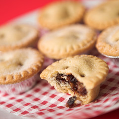 Arrangement of Mince pies (one's been eaten!) - shallow dof