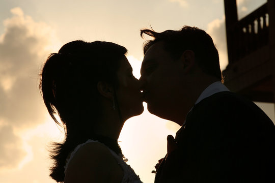 Silouette Of A Couple On Their Wedding Day