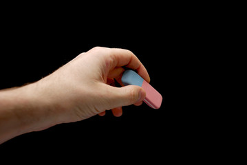 eraser in a hand