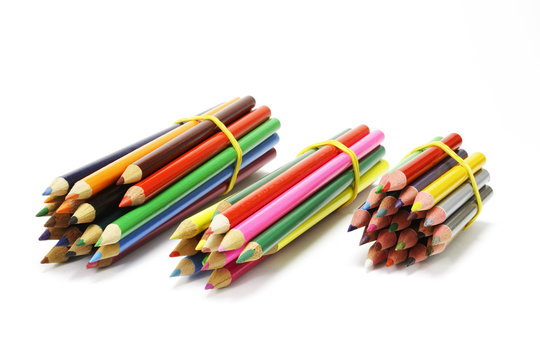 Bundles of Colour Pencils on White Background
