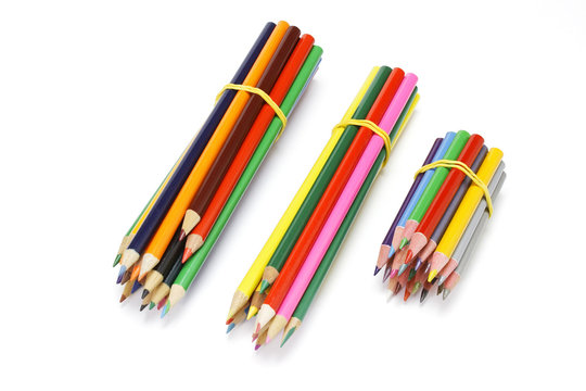 Bundles of Colour Pencils on White Background