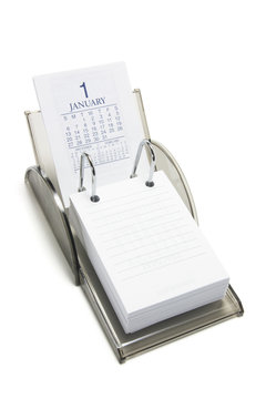 Desk calendar on white background